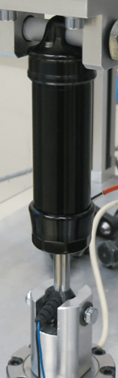 MR linear damper mounted on a test bench for performance evaluation