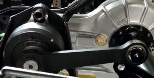 Close-up of a rotational damper integrated into a mechanical system for precise torque control.